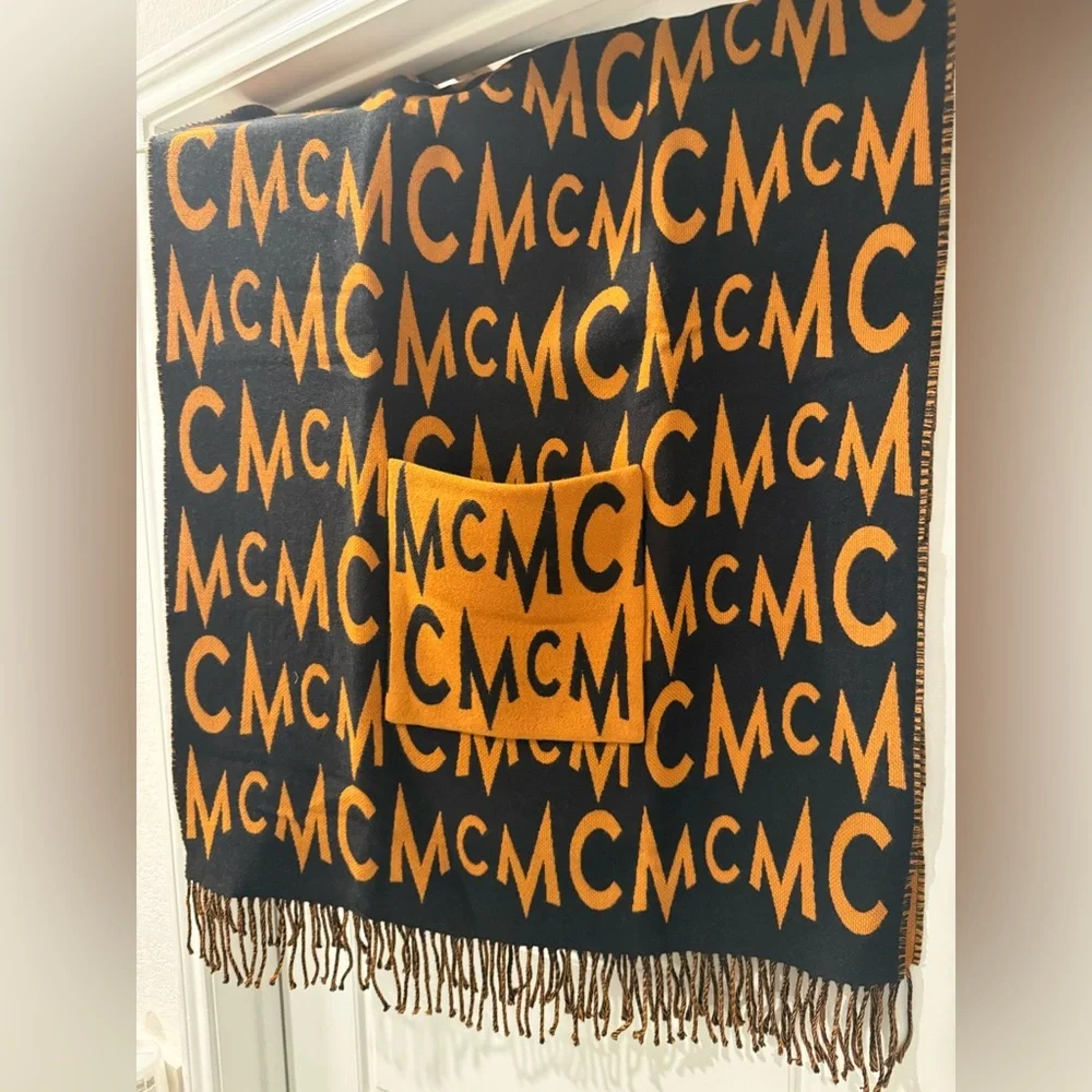 MCM DOUBLE SIDED STOLE/SHAWL
SIZE:  one size 
COLOR:  Cognac / Black - Picture 3 of 5